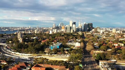 Canvas Print - Lower North Shore residential suburbs in Sydney – aerial flying 4k at freeway.
