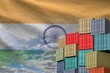 © mehaniq41 - India flag and big stack of shipping cargo containers in docks with sky background close up