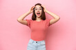 © luismolinero - Young Ukrainian woman isolated on pink background with surprise expression