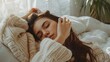 © Farid - Woman sleep on the bed turns off the alarm clock wake up at the morning, Selective focus.