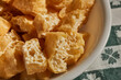 © Brian Yarvin - A bowl of fried, sliced tofu puffs, a classic Asian ingredient