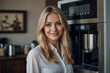 © Александр Поташев - The girl, the Barista next to the coffee machine.