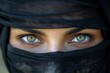 © Katsiaryna - close up of beautiful arabic woman's eyes in black veil