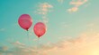 © Farid - Two pink balloons on panoramic sky background, love and couple concept.
