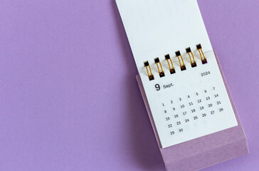 Monthly desk calendar for September 2024 on your desktop. Copy space.