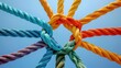 © Dirty Pure - Colorful Ropes Intertwined in a Circle Against a Blue Sky