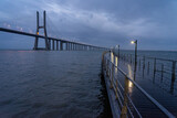 Rainy night image of the Vasco da Gama bridge from the Parque das Naçoes in Lisbon.