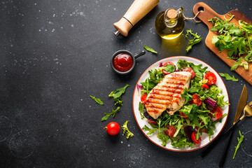 Canvas Print - Dash diet plate. Chicken steak with fresh salad on black background. Top view with copy space.