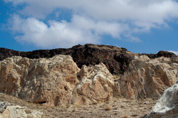 Wall Mural - landscape with blue sky and clouds, rocks in the mountains, landscape with blue sky,  Türkiye mountains, Cappadocia highlands