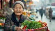 © Jafree - Elderly Asian woman at a market holding a basket of vegetables. Concept of senior, market, healthy eating, culture