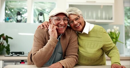 Canvas Print - Hug, love and smile with old couple in kitchen of home together for bonding or retirement. Portrait, romance or support with happy man and woman embracing in apartment for break, relax or rest