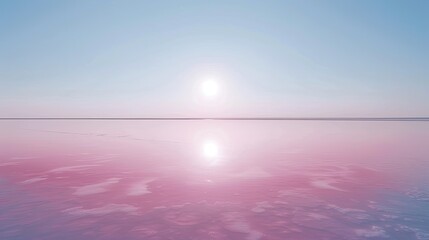 Wall Mural - A beautiful blue and pink sky with a calm ocean