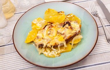 Sticker - Appetizing pork with cheese and boiled potatoes on a plate