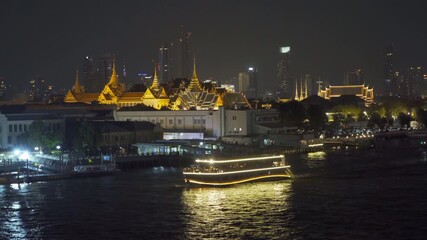 Wall Mural - Golden pagoda at Temple of the Emerald Buddha in Bangkok, Thailand. Wat Phra Kaew and Grand palace in old town, urban city. Buddhist temple, Thai architecture. A tourist attraction.