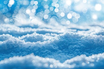 Wall Mural - A blue sky with snowflakes falling on it. The snow is white and fluffy. The sky is clear and bright