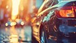 © Rainister - Closeup of a black car parked on an urban street, with sunset light filtering through