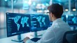 © Ndoomyim - Analyst Monitoring Data on Multiple Screens