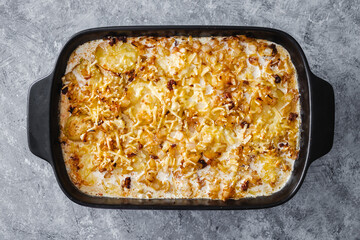 Wall Mural - cheesy creamy potato bake before going in the oven