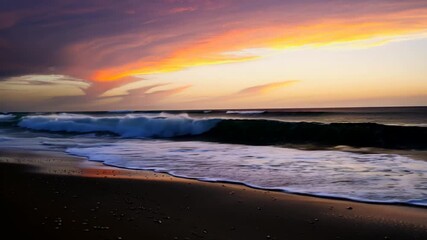 Poster - Waves Gently Washing Ashore at Sunset With Vibrant Clouds in the Evening Sky Generative AI