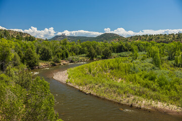 Wall Mural - Mountain river with Chimney Rock in the distance