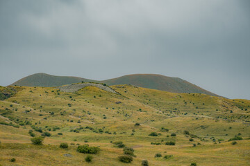 landscape with mountains and clouds