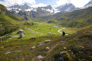 The valley of the petite Sassiere, Sainte Foy Tarentaise, Northern French Alps, Savoie, France, with the mountain refuge of Ruitor, the hamlet Sassiere and mountain streams