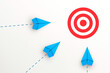 © Worawut - Target or Business competition concept with Blue paper planes on white background. target icon