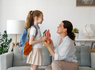 Wall Mural - Happy family preparing for school