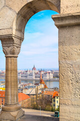 Wall Mural - View of Hungarian Parliament building through the arch at Buda Hill