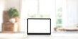 © Smile Studio AP - A laptop with a blank screen sits on desk blur background.