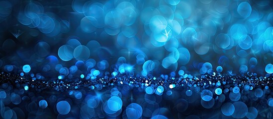 Poster - A blue glare stands out sharply against a dark bokeh filled backdrop in the copy space image