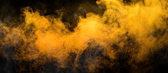 Fototapete - A vibrant yellow mist against a dark backdrop with available copy space image