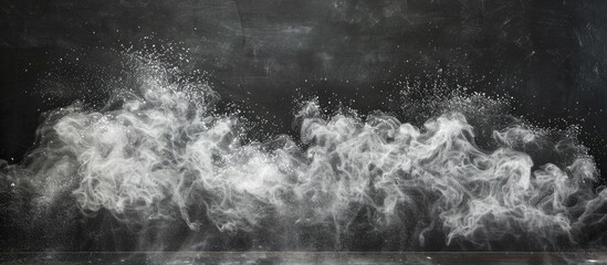 Sticker - Chalk dust creating an abstract pattern on a blackboard with copy space image available