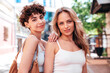 © halayalex - Two young beautiful smiling hipster female in trendy summer white t-shirt and shorts clothes. Sexy carefree women posing in the street. Positive models having fun, hugging and going crazy