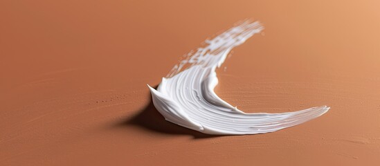 Aufkleber - Detailed close up of a white cream and clear serum smudge cosmetics on a brown background with available copy space image Beauty and health concept focusing on makeup and colors