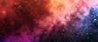 © HN Works - An abstract powdery background with frozen motion capturing an explosion of color powder displaying a vibrant multicolor glitter texture with a copy space image