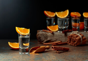 Wall Mural - Tequila shots with orange and cinnamon.