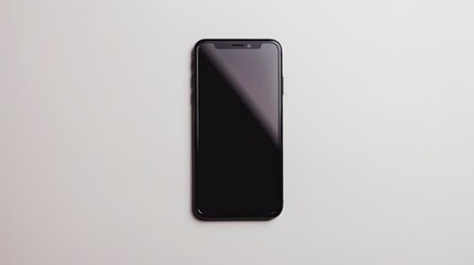 Aufkleber - A black smartphone lies on a white surface, its sleek and modern design highlighted by the blank black screen, symbolizing contemporary digital technology and communication.