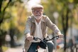 © Igor - Energetic joyful and smiling elderly man riding bicycle
