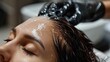 © Attasit - A woman receiving a keratin treatment, highlighting hair smoothening and care