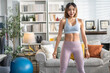 © Art_Photo - Portrait of sport slim fit strength asian woman training in sportswear sitting relax and practicing yoga, fitness, exercise, wellness, workout, sport at home.Diet concept.Fitness and healthy lifestyle