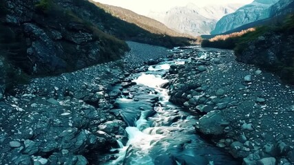 Poster - The creek splits into several smaller branching streams each carving its own path through the rocky terrain of the mountain.