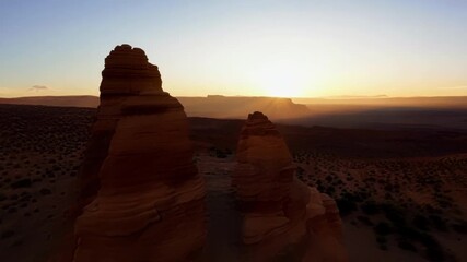 Sticker - Timelapse of shifting shadows and hues in a rocky desert landscape as the sun makes its journey across the sky.