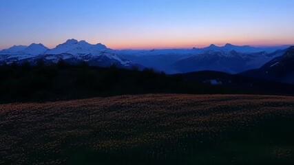 Poster - A serene glide above the alpine meadows at twilight a breathtaking display of natures colors and textures.