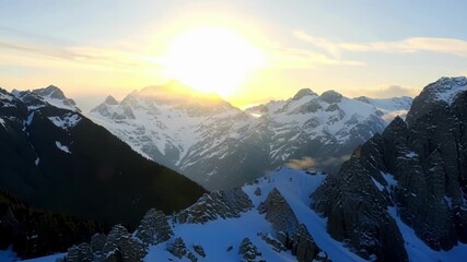 Poster - The crisp air and serene stillness of the morning make for a perfect setting to capture the sunrise on the snowy peaks.