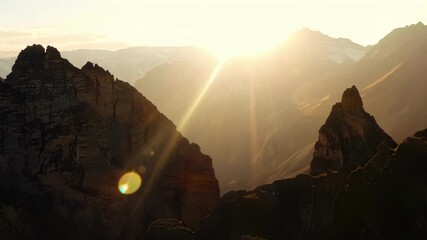 Poster - These rugged mountains seem to reach towards the sky eager to soak in the first rays of sunlight.