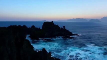 Poster - Marveling at the untouched beauty of the rugged islands at dusk with no signs of human life to disrupt the natural landscape.
