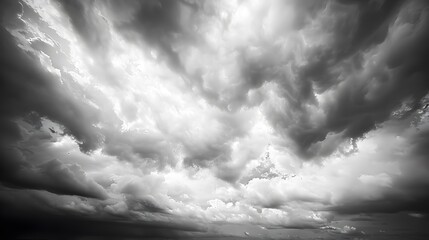 Wall Mural - Beautiful cloudy sky in a black and white photograph
