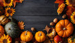 © Dmitrii - thanksgiving dinner background with turkey and all sides of the dish pumpkin pie autumn leaves and seasonal autumn decor on a wooden background top view copy space.