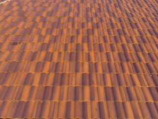 Background of orange brown new house roof texture in rural village real estate industry